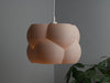 Gray ceiling light shade with a soft, diffused light pattern, creating a warm and cozy atmosphere in your living space.