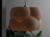 Sleek gray pendant light shade with a bubble texture, perfect for adding elegance to any modern home or office decor.