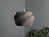 Gray wavy lampshade with a dynamic pleated wave texture, a sophisticated choice for ceiling lamp shades.