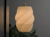 White ceiling lamp shade with pleated spiral design. A large lampshade ideal for modern interiors.