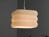 Elegant white pendant light shade with a unique pleated structure, designed to enhance any home interior.