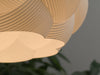 Modern white pendant light shade with bubble texture, ideal for contemporary home lighting setups.