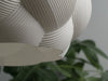 Contemporary small lamp shade in white with a bubble texture, adding a touch of elegance to any room.